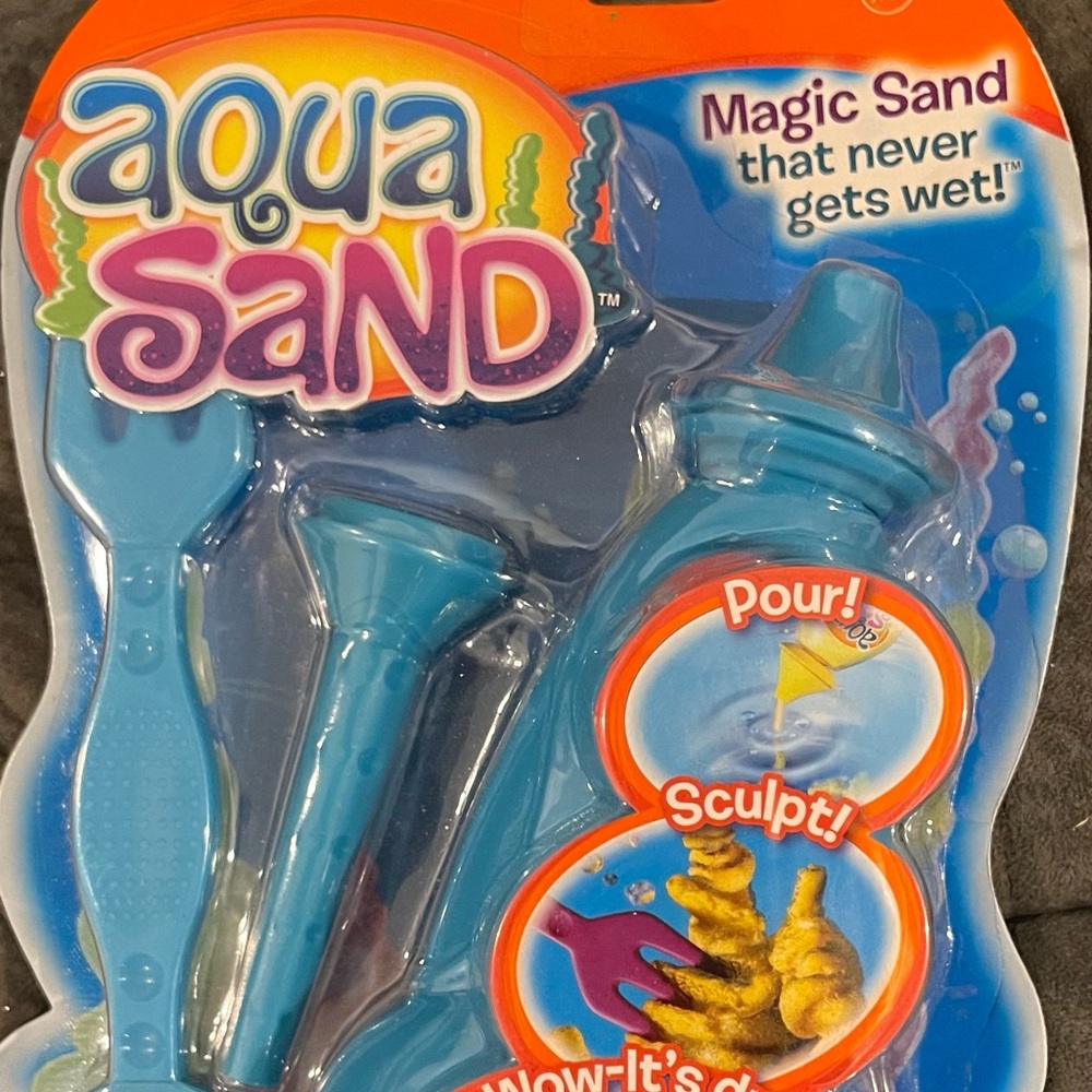 NEW in package - Aqua Sand - the sand that doesn’t get wet.
